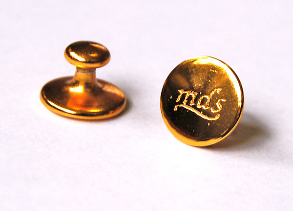 Picture of Brass Collar Buttons.